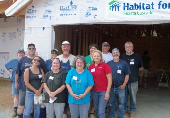 City Staff and Community Members work on a  Habitat for Humanity Home.